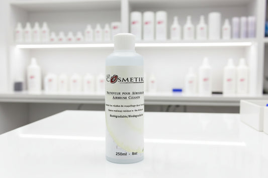 Bottle of Airbrush Cleaner with 'Cosmetik' branding on a white background